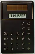 Calculadora solar ultradelgada (~ 2 mm de espesor), (1990).