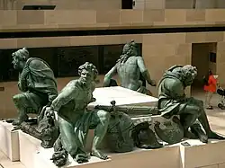 Cautivos del monumento a Luis XIV en Place des Victoires, de Martin Desjardins (1679)[11]​