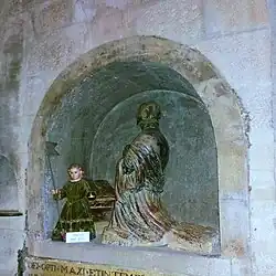 Sepulcro y estatua orante de Don Juan de Noboa y Villamarín.
