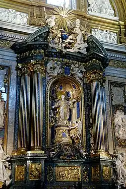 Capilla de San Ignacio, en la misma iglesia, de Andrea Pozzo. Las esculturas son de artistas franceses.[44]​