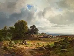 Amplio paisaje con un rebaño de ovejas