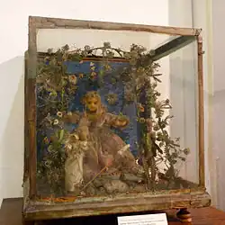 Niño Jesús rodeado de vegetación (cera vestida de finales del SXVIII)