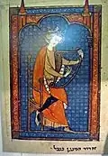 Réplica de manuscrito francés con "El rey David tocando el arpa", Troyes, c. 1280 (original en la British Library, Londres).