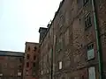 Lado oeste del Main Mill c.2002 antes de la restauración.