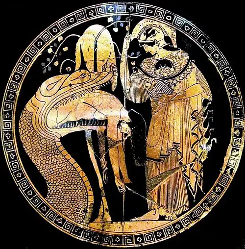 Cílix pintado por Duris en el que aparece Jasón regurgitado por el dragón que custodiaba el vellocino de oro, con Atenea a su lado. 480-470 a. C., Museos Vaticanos.