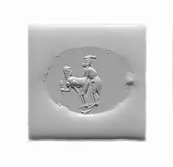 Sex between a female and a male. Engraved scaraboid (gem), White chalcedony. Greco-Persian. 4th century BCE.