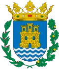 Escudo de Alcalá de Henares, con un castillo donjonado.
