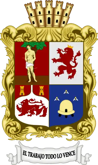 Corona mural de villa en el escudo de León.