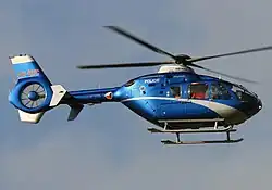 Blue-and-gray police helicopter