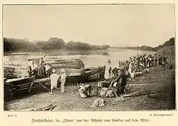 photographie d'une expédition embarquant sur un cours d'eau