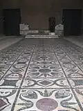 Suelo en el centro de la Curia, opus sectile restaurado.