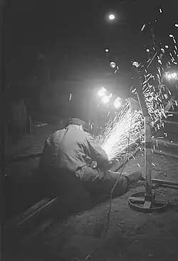 De Menschen bei der Arbeit.