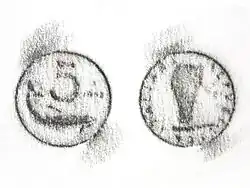 Frottage de una moneda.