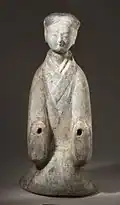 Estatuilla funeraria de un "animador arrodillado", dinastía Han (206 a. C.-25 d. C.)