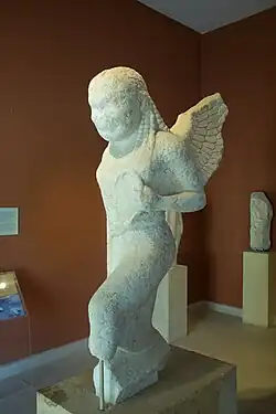 Estatua de gorgona del periodo arcaico.