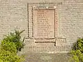 Lápida en homenaje a los obreros de la fábrica D. Jordaan & Zonen, víctimas civiles de la Segunda Guerra Mundial