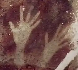 Cave of Pettakere, Bantimurung district (kecamatan), South Sulawesi, Indonesia. Hand stencils estimated between 35 000 and 40 000 years old[32]​