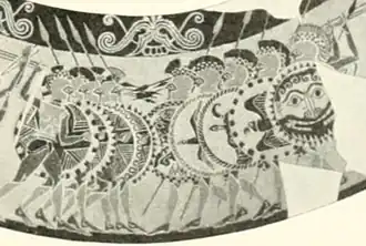 Vaso Chigi, un olpe (ολπη -jarra, más pequeña que el oinokhoe-) protocorintio (ca. 650 a. C.) hallado en una tumba etrusca.[27]​