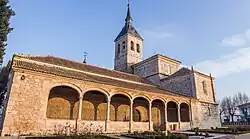 Iglesia Parroquial Asunción de Nuestra Señora, en la plaza del Sol, de Torres de la Alameda. Es una iglesia grande de estilo renacentista, tiene un atrio porticado con arcos y una torre con campanario y chapitel.