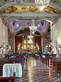 Iglesia de la Purísima Concepción, Baclayon. Iglesia de cruz latina y techo de par y nudillo con falso plafón.