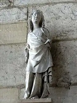 Santa coronada sosteniendo un libro en su mano izquierda, alrededor de 1320.