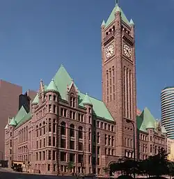 Four of city hall's turrets seen near the roof