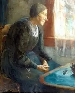 Figura en la ventana.