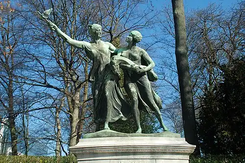 « El genio belga guiando al Congo » (Monument General Thys, Cincuentenario, Bruselas).