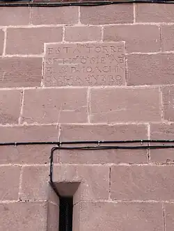 Inscripción en la torre con la fecha de finalización