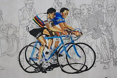 Mural en Castellania. Fausto Coppi (con el maillot arco iris) y su hermano Serse