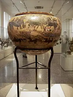 Dino de cerámica ática de figuras negras. Trípode de dino-lebeta decorado, c. 570–560 a. C.