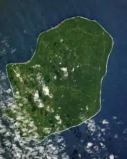 Satellite image of Niue, a low island and former atoll, where reef and lagoon have risen above sea level due to uplifting