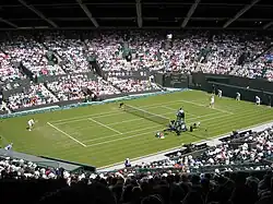 Disputa de un partido de tenis en Wimbledon.