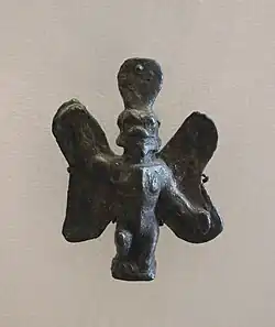 Estatuilla de bronce de Pazuzu en cuclillas. Museo del Louvre.