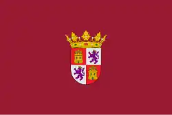 Pendón oficial de Castilla y León, que lleva el escudo de la comunidad «sobre un fondo carmesí tradicional»