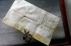 Pergamino 11 con sello de cera, de Leonor de Aragón, 1376