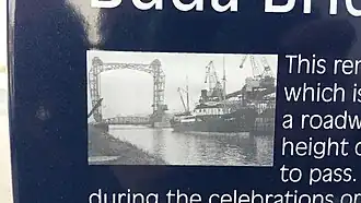 Panel explicativo, detalle de foto antigua.