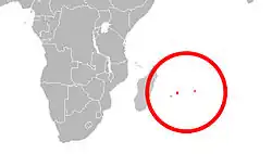 Antiguo rango geográfico (en rojo).