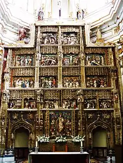 Retablo mayor de la iglesia del Monasterio de Santa María de El Paular, probablemente del taller de Juan Guas (finales del siglo XV), de alabastro policromado.