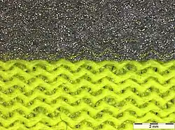 Material retroreflectivo bajo microscopio, 8 x