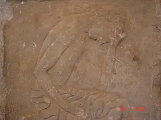 Relieve con la representación de un adolescente procedente de Geraki, del siglo VI a. C.