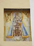 Retablo cerámico de la Virgen de los Desamparados en calle Santa Ana