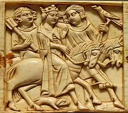 Tristán e Isolda, de caza con perro y halcón, en un marfil del siglo XIV.