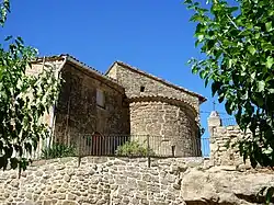 Cal Fustegueres y la iglesia
