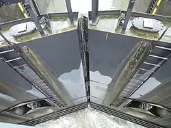 Área de presión y sellado de una compuerta