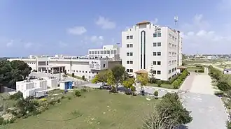 The Faculty of Medicine and the affiliated Palestinian-Turkish Friendship Hospital buildings south of Gaza city (southern view).