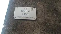 Placa de calle con su nombre en Erice, Sicily