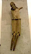 Torso del Crucifijo de San Jorge (c. 1067), con una forma corporal igualmente hinchada y rasgos de sufrimiento. Colonia, Museo Schnütgen (n.º inv. A 9).