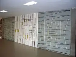 Mural de Víctor Valera Título: Sin título. Año: 1955. Ubicación: Entrada noreste, planta alta, subiendo por la escalera.