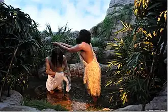 Escena 10: San Juan Bautista y el bautismo de Jesús en el río Jordán